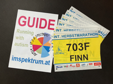 Startnummern zum Herbstmarathon und ein Zusatzschild mit "Guide"
